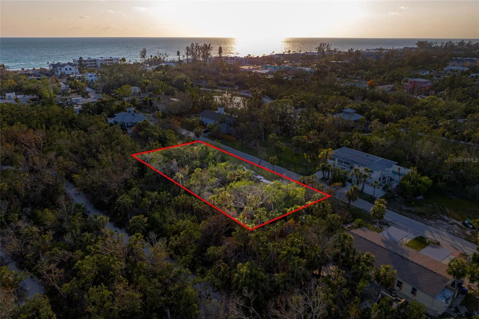 One of the last remining gems on Longboat Key. A double lot with no HOA.