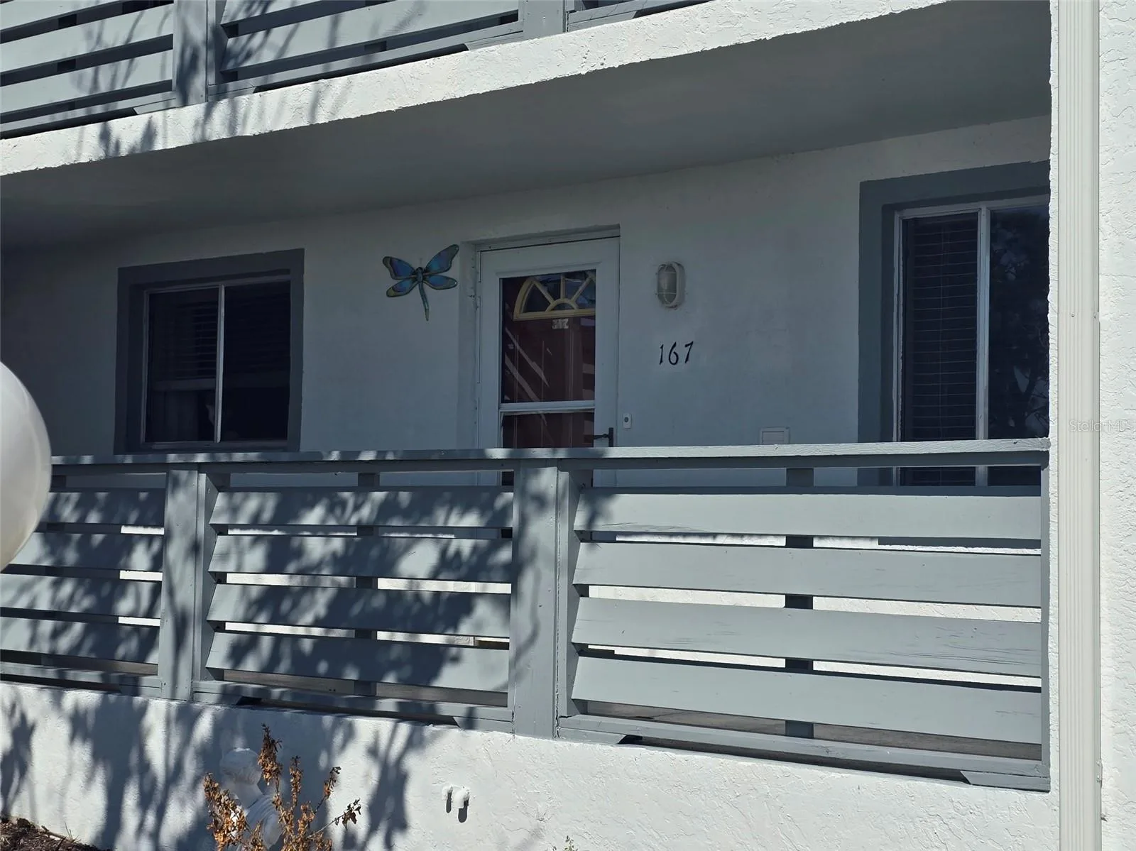 Front door with shaded porch