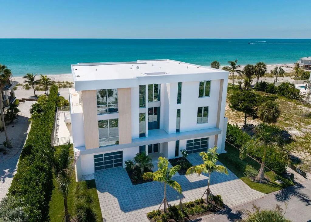 Welcome to 6489 Gulfside road on Longboat Key. Recently completed and ready for move in! Designed by DSDG Architects, built by Seaward Homes