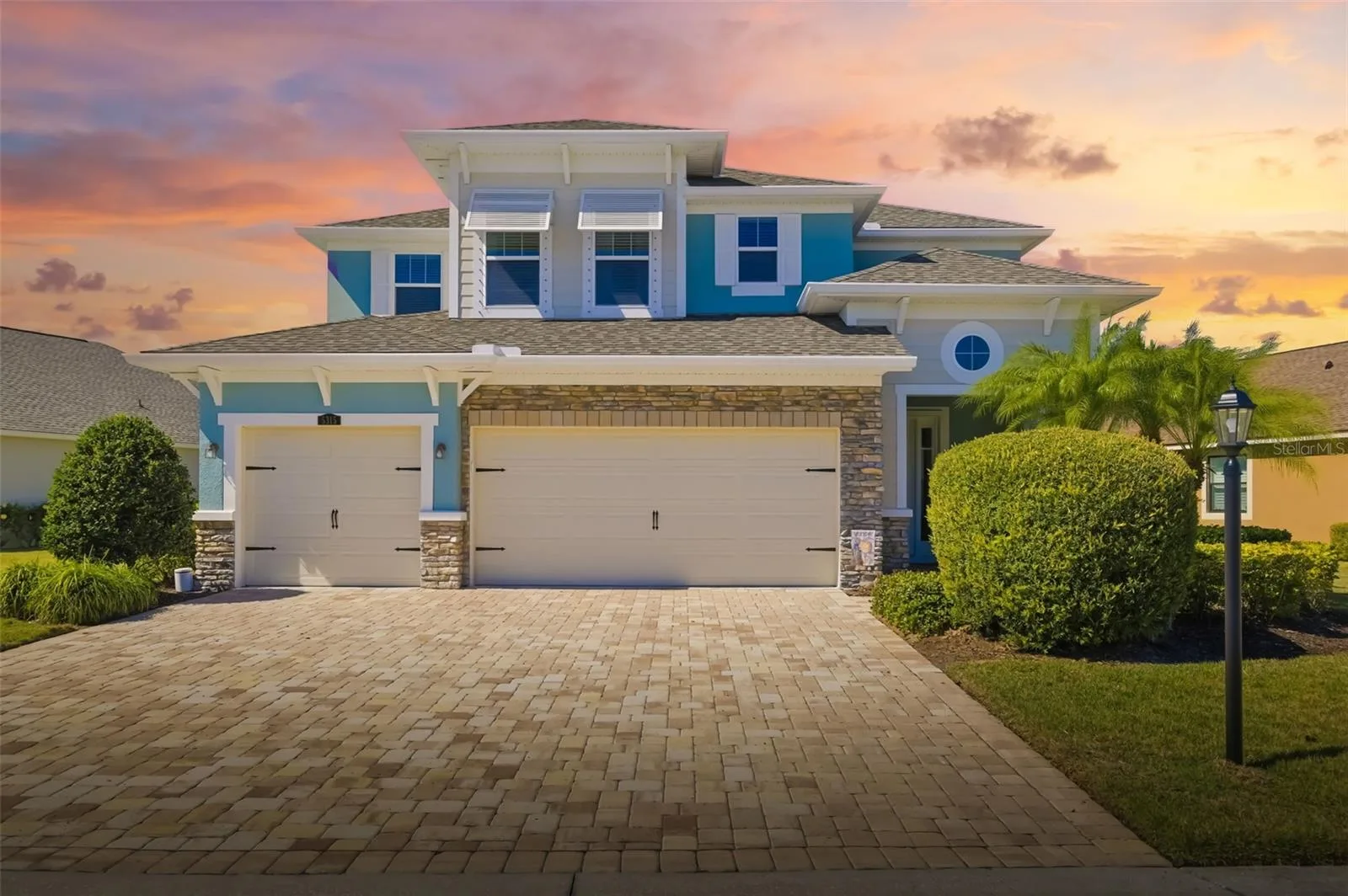 One of Harmony's premier waterfront homes on an oversized homesite.