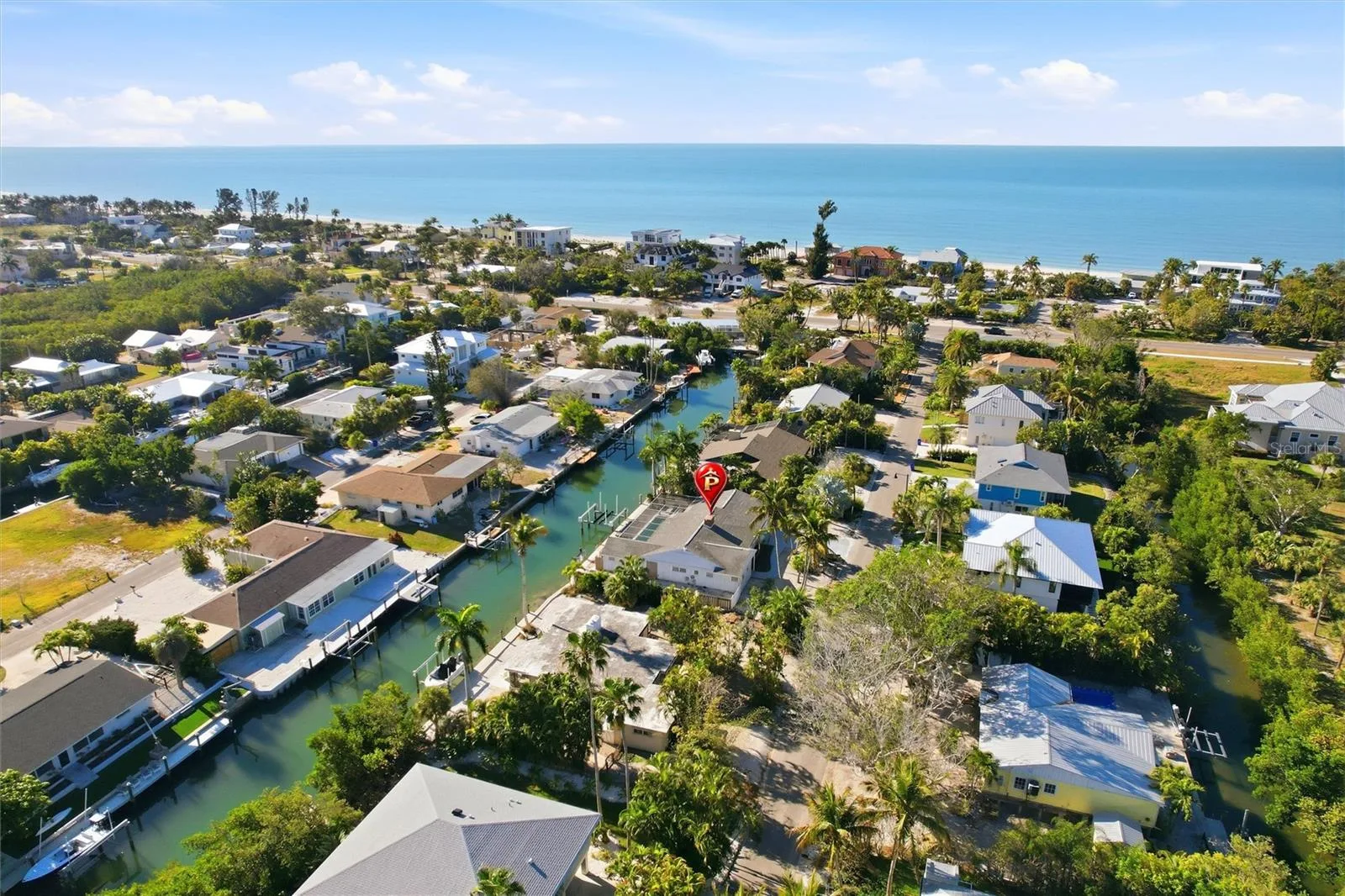 Deep water Canal home with beach on beach and Gulf at end of street