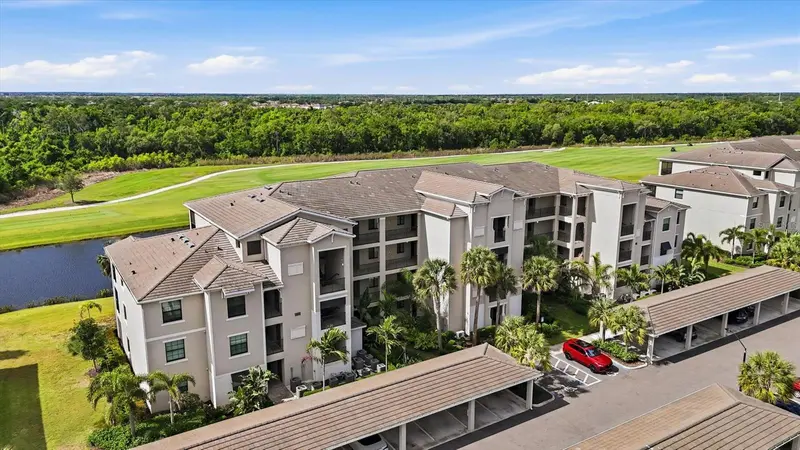 18008 GAWTHROP DRIVE #401, BRADENTON, photo 2 of 78