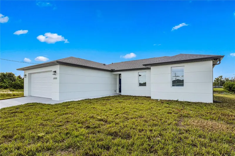 12025 CLARENDON AVENUE, PORT CHARLOTTE, photo 3 of 35