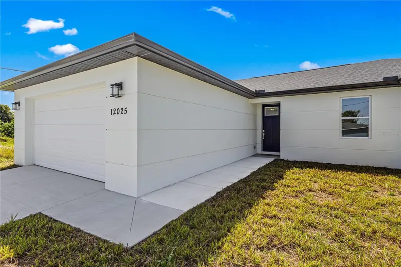 12025 CLARENDON AVENUE, PORT CHARLOTTE, photo 4 of 35