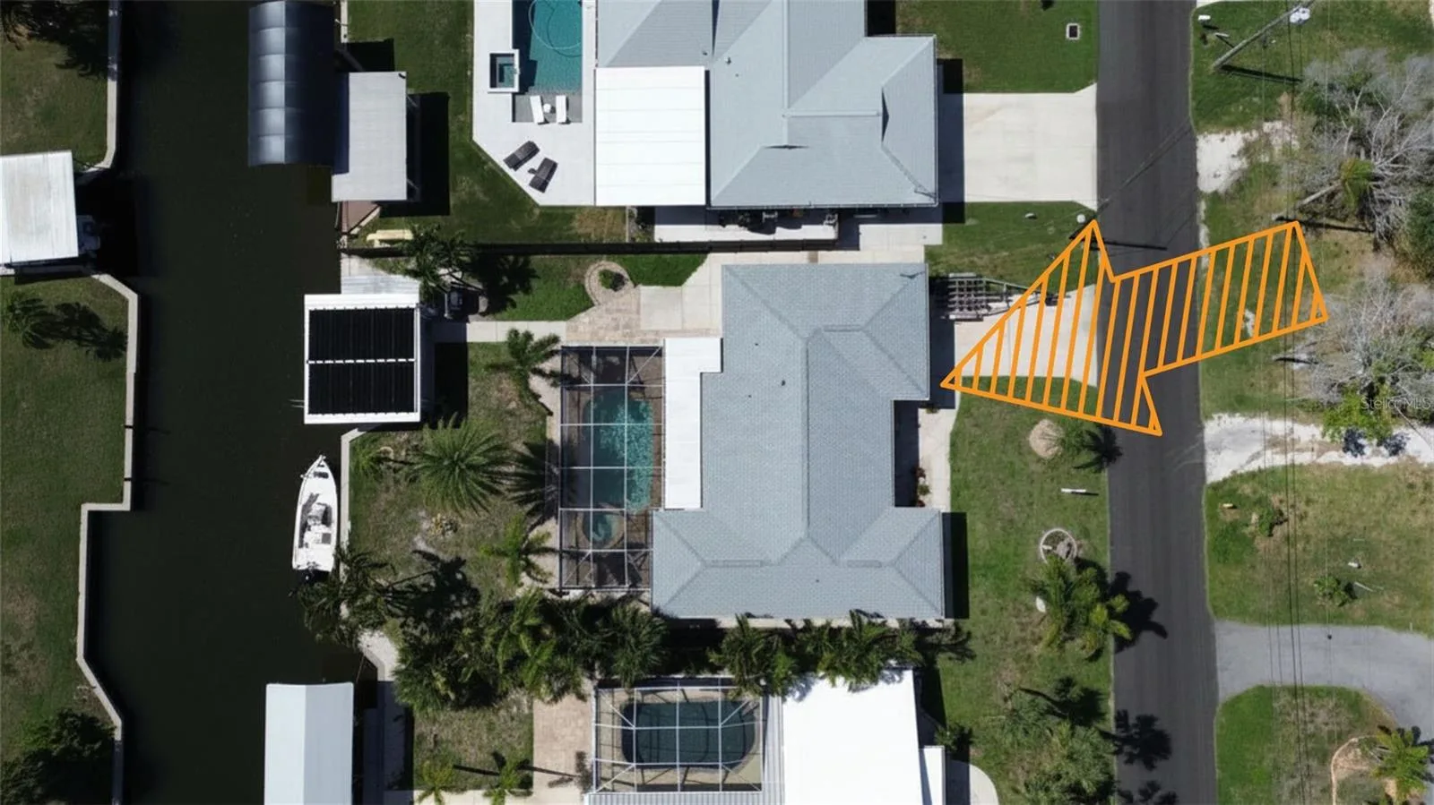 Overview of home showing wide deep canal