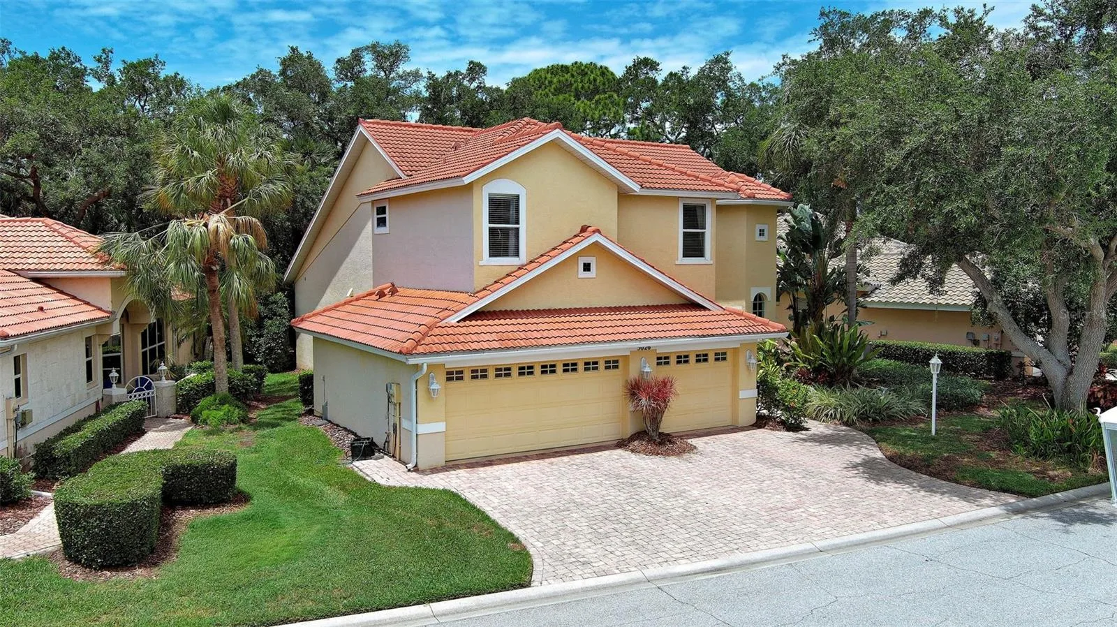 Wow! Amazing Curb appeall in this renovated home and Backed up to a preserve, the home has a paver driveway and mature tropical landscaping.