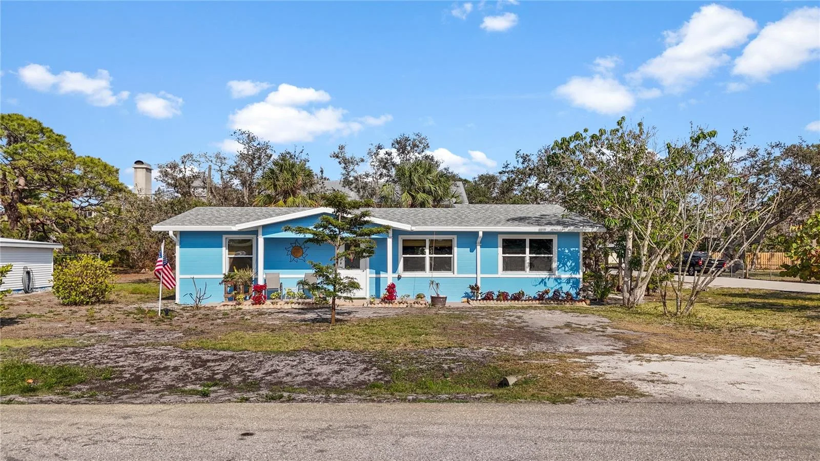 This cute cottage is on a corner lot near the Amerjack Environmental Park off of Placida Road. It's close to marinas and public boat launches.