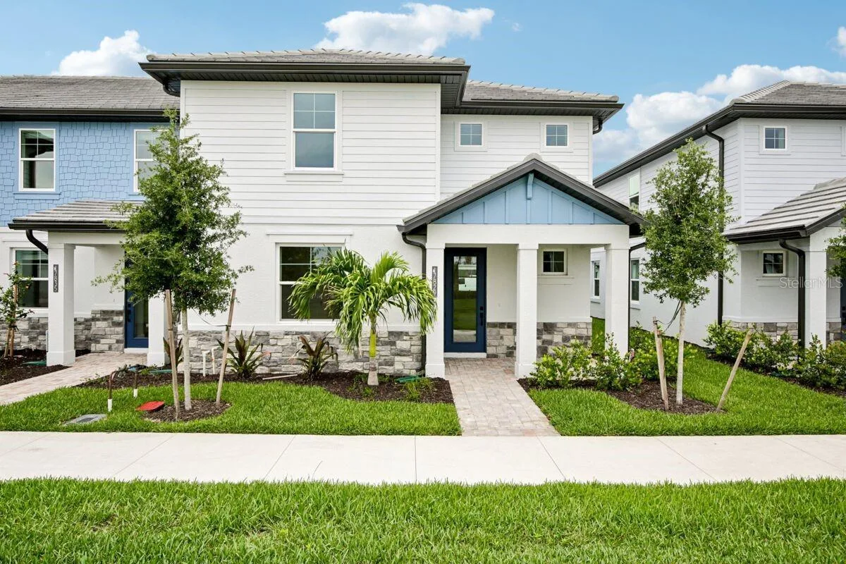 Front Exterior-Photo description represents the model home of same floor plan.