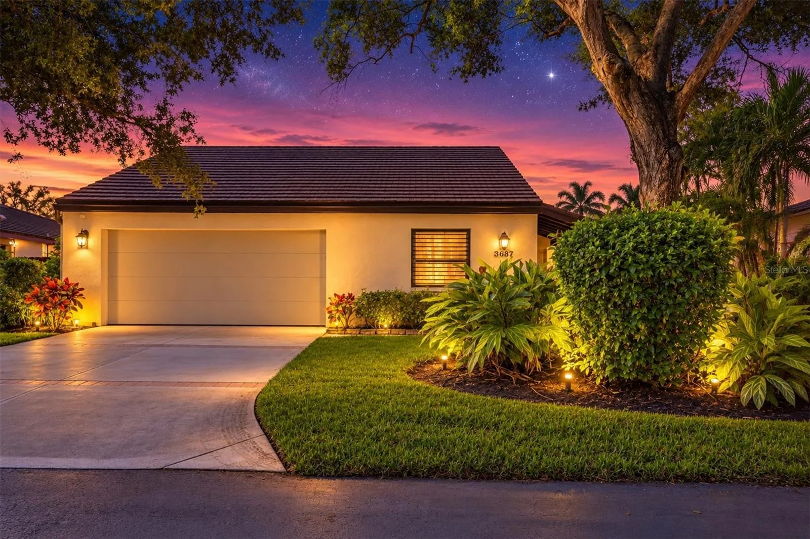 Attached villa with a 2 car garage