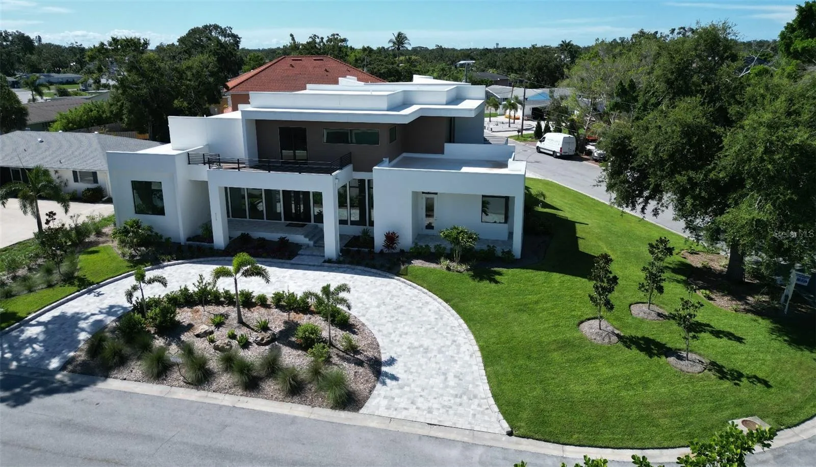 Approximately 1/3 acre lot. Circle drive in front, oversize 3 stall garage in rear.