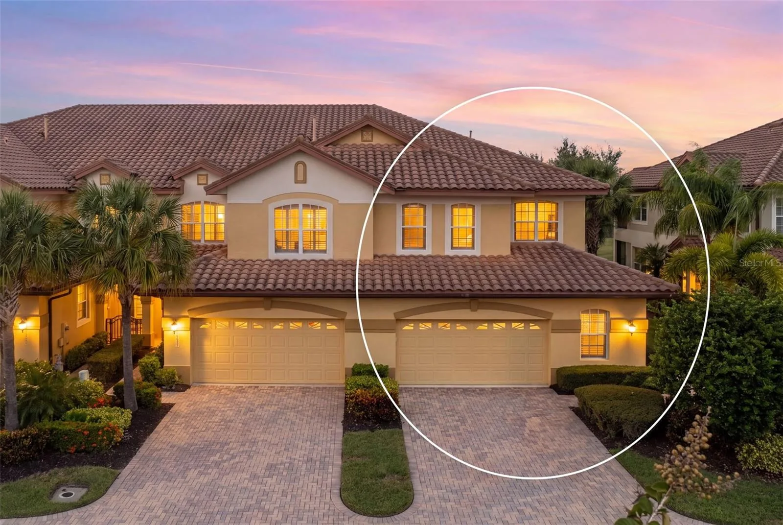 A warm welcome home, with a spacious driveway and oversized two-car plus golf cart garage.